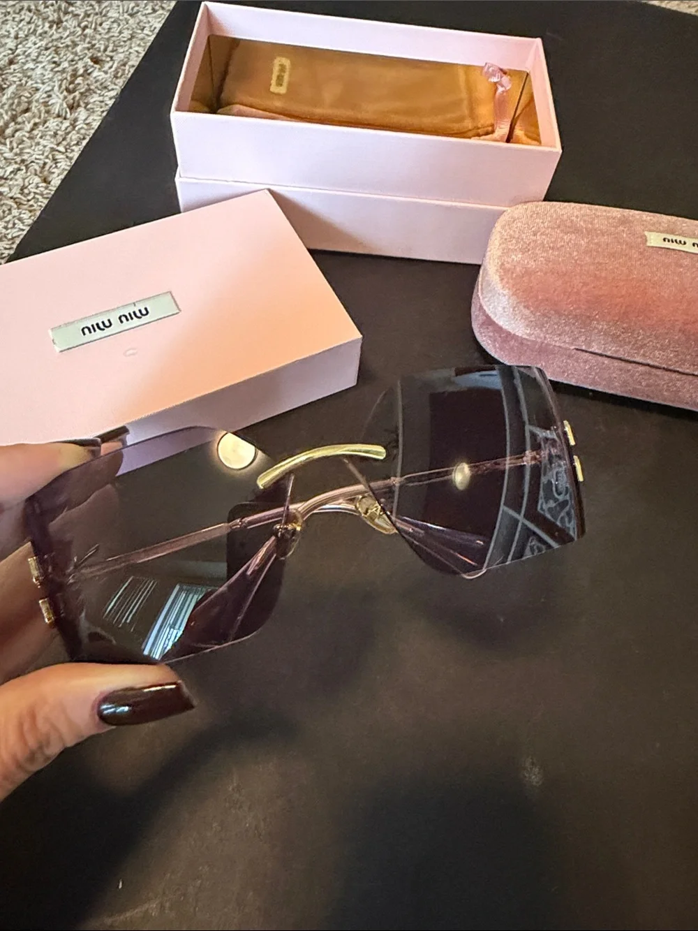 Miu Miu Rimless Sunglasses with Purple Gradient Lenses and Gold Accents